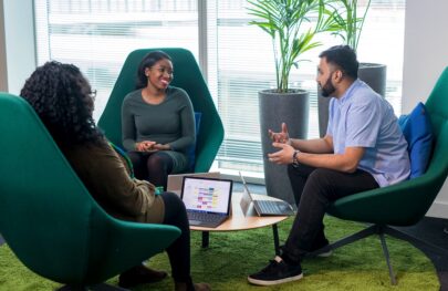 colleagues chatting in an informal work environment