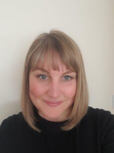 Image of HMRC employee Amanda smiling at the camera
