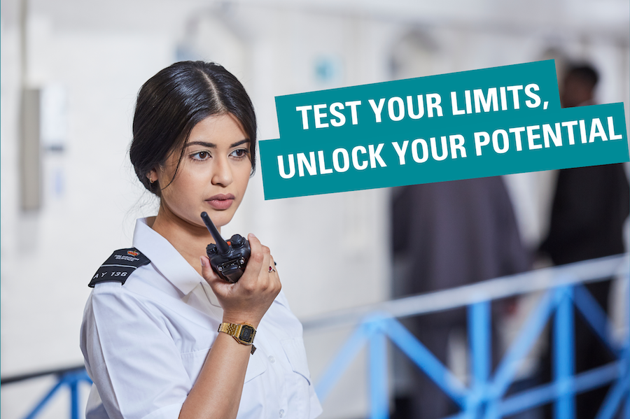 A prison officer talks into a radio. A tagline across the image says
