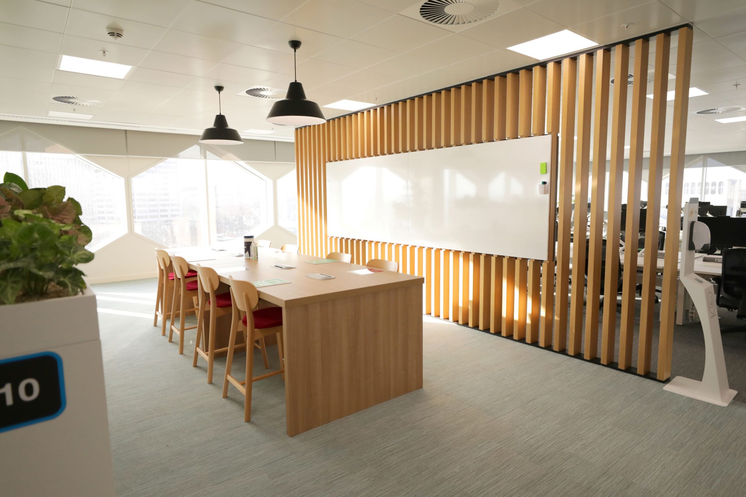 Decorative Image: Image of Meeting Table and white board inside DWP's Birmingham Hub