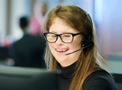 Young girl wearing headset smiling