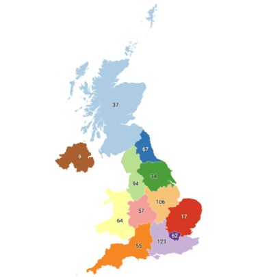 The image shows a map of the UK with regions highlighted in different colours. Each region shows a number representing how many people were placed in roles through Going Forward into Employment schemes between April 2022 and December 2023. The number of roles in each region of the UK is as follows: Scotland - 37 Northern Ireland - 6 Wales - 64 North East England - 67 North West England - 94 Yorkshire and the Humber - 34 West Midlands - 57 East Midlands - 106 South West - 55 East of England - 17 South East England - 123 London - 63