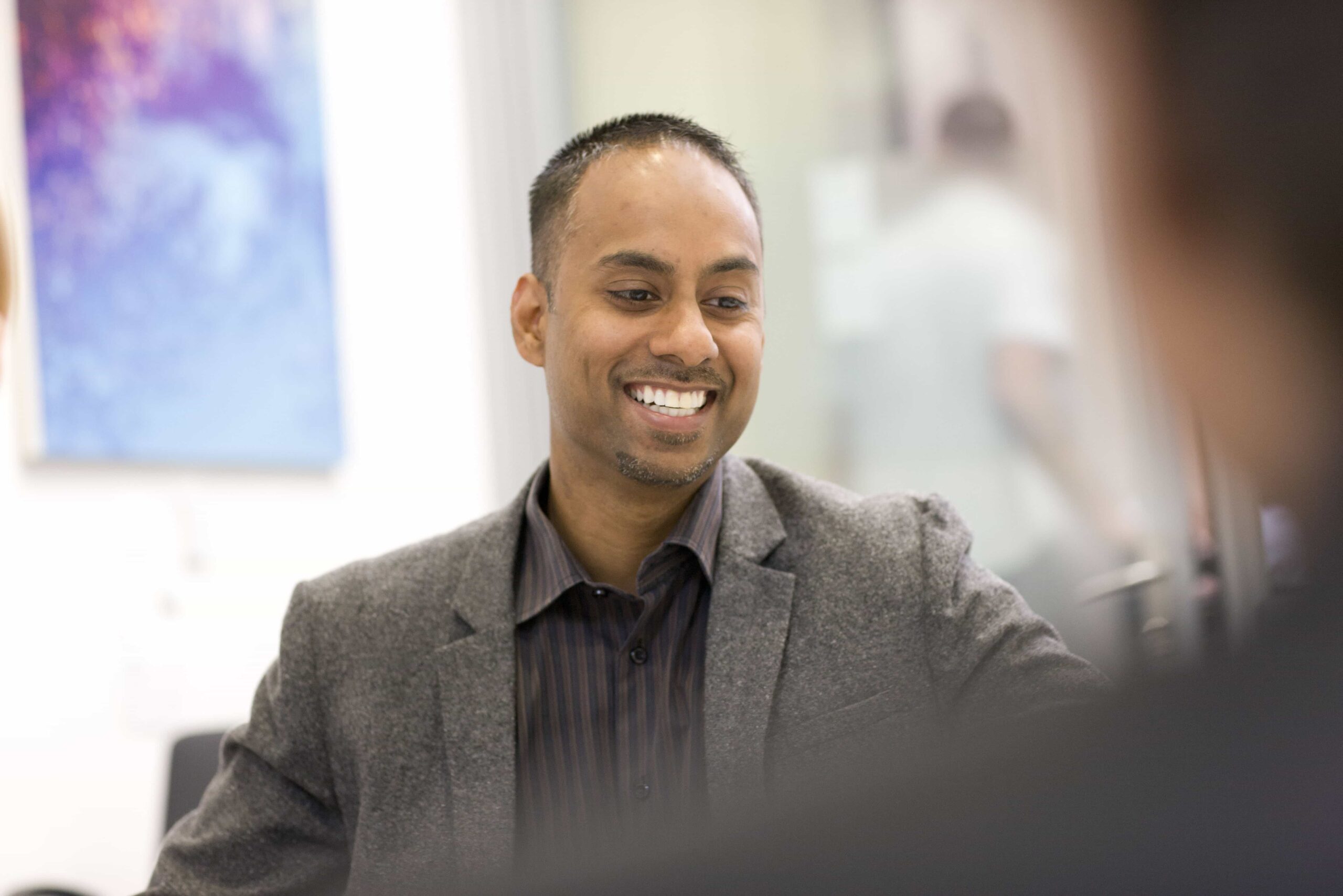 male colleague smiling