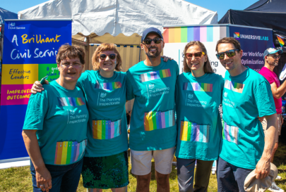 A group of colleagues at a Pride event