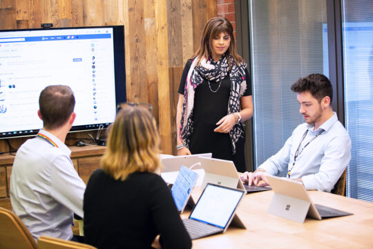 Image of HMRC employees working