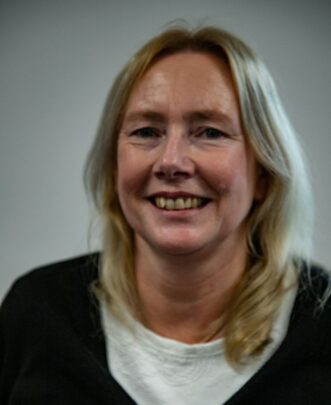 Headshot of Ros Burch, Level 7 Leadership apprentice working in HMCTS.