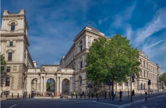 FCDO S - Decorative image: a photo of Whitehall on a summer's day.
