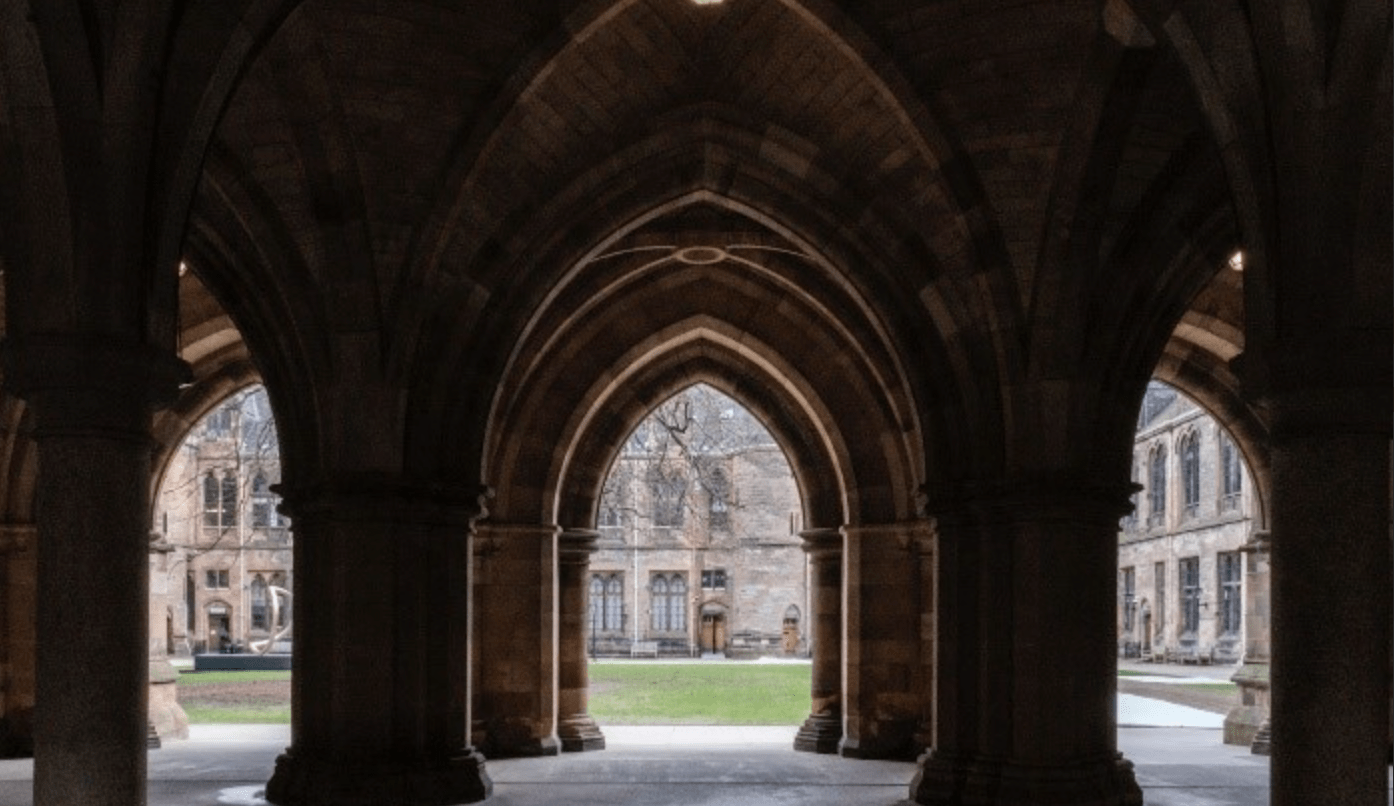 The impressive structural arches of a building at the University of Glasgow.