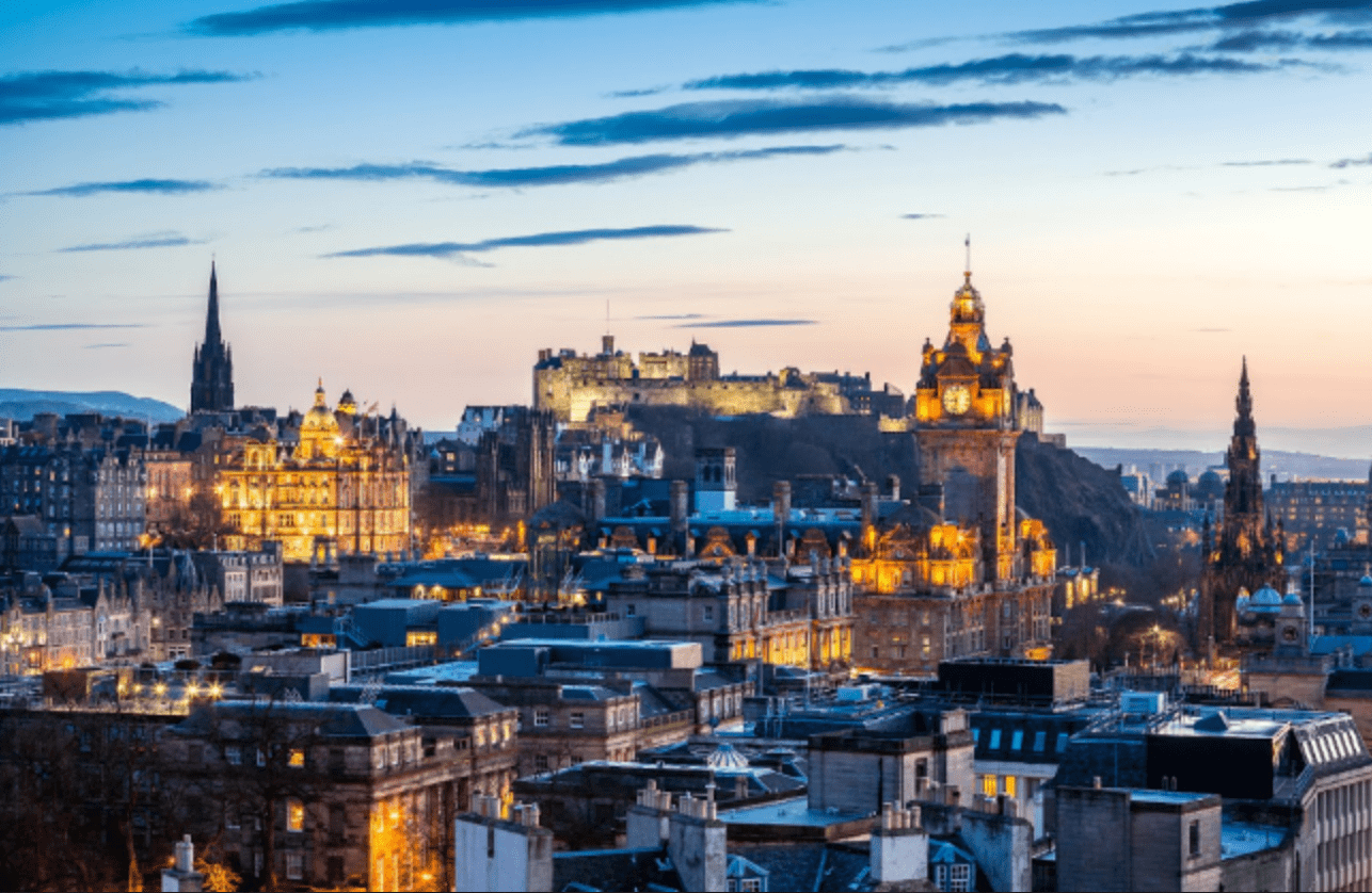 A photo of the Edinburgh skyline in the early morning