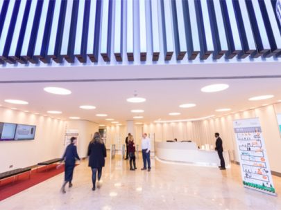 A photo of the Department Of Health And Social Care Office building foyer. It is light and open and welcoming.