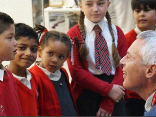 Minister Talking to School Children
