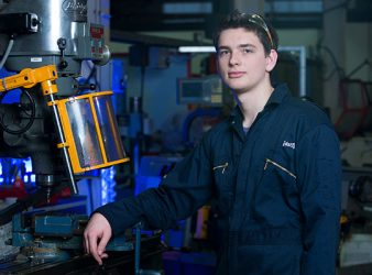 A photo showing a male DSTL engineer in a workshop