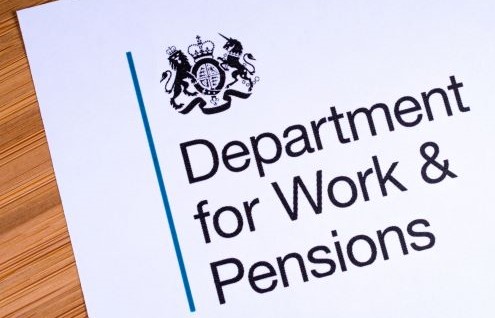 Image of DWP logo on a sheet of paper on a desk
