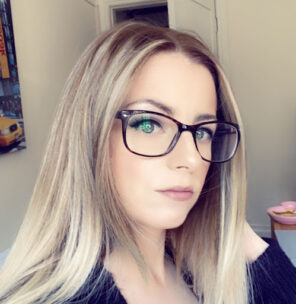 Photo of Siobhan Russell Crown Prosecution Service, Magistrates’ Court. She has long blonde hair and dark-rimmed glasses