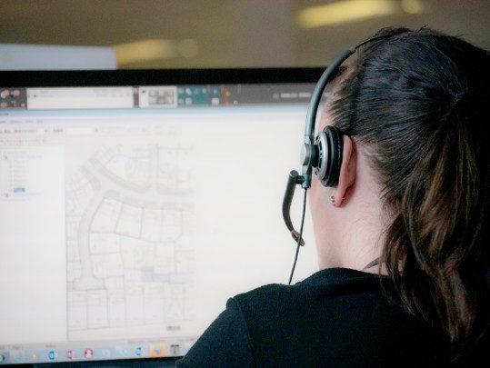 Team Member With Headset At Hm Land Treasury