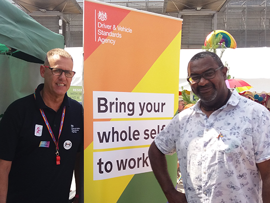 Two Dvsa Team Members At Stall