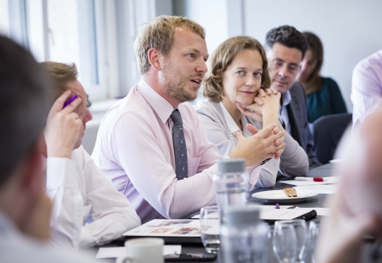 Some Project Delivery Professionals in a Meeting